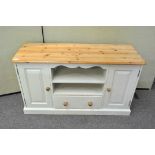 A lime painted pine side cabinet,