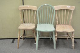 A duck egg painted kitchen chair and two stripped kitchen chairs,