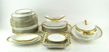 A Limoges porcelain part dinner service, retailed by F A Schumann,