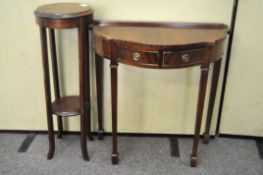 An Edwardian mahogany jardiniere stand, 86cm high, together with a Regency style hall table,