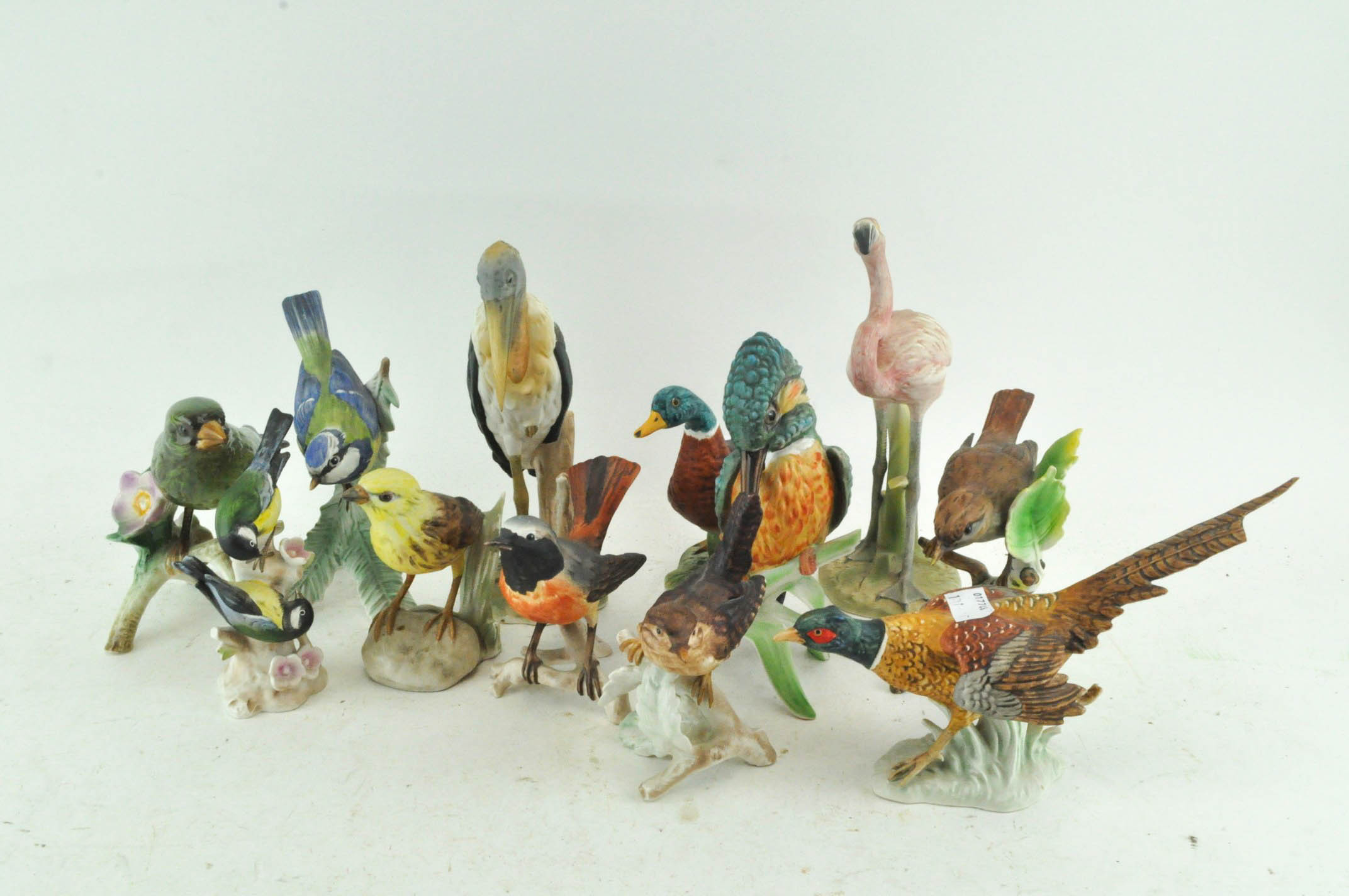 A collection of 12 Goebel figures of birds,