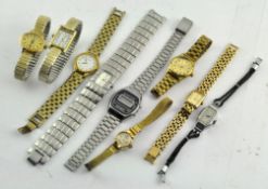 A collection of vintage wristwatches, mostly ladies,