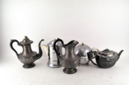 A silver plated coffee pot and ewer;