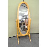 A beech framed cheval mirror,