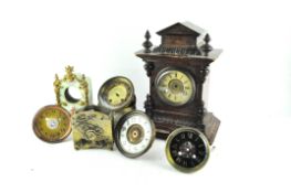 An oak cased mantel clock;