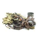 A group of military items, including webbing, a leather belt,