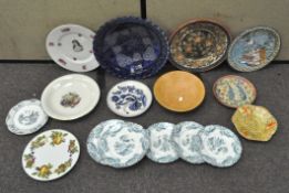 A mixed group of assorted ceramics, comprising plates and bowls,