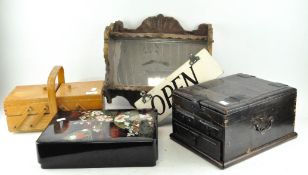 A metamorphic wooden sewing box, a wall shelf unit,