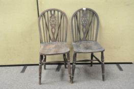 Two wheel back Windsor style kitchens chairs,