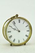 A French mantel clock, of circular form, the movement stamped Brevete,