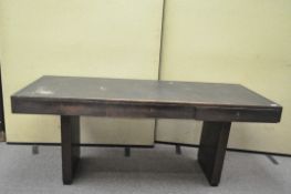 An oak library table, fitted with three drawers,