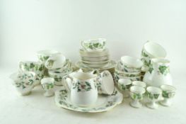 A Wedgwood 'Santa Clara' and a Crown Staffordshire part dinner service