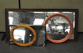 A group of five mirrors, to include a walnut framed dressing mirror,