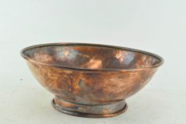 A copper footed bowl,