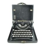 A vintage Underwood portable typewriter in original case,