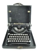 A vintage Underwood portable typewriter in original case,