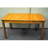 A pine kitchen table, 74cm high, 84cm wide,