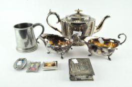 A silver plated teapot, sauce boats,