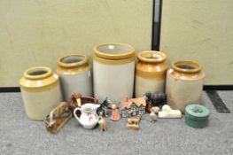 Five stoneware storage jars,