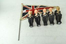 A collection of five figures of Winston Churchill in Black Tie smoking a cigar,