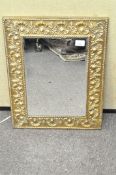 A brass framed wall mirror,