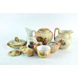 A collection of Royal Worcester porcelain, predominately blush ivory ground and flowers,