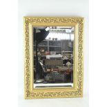 A gilt framed wall mirror,