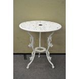 A Victorian style white painted metal patio table,