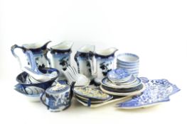 A collection of blue and white ceramics including British,