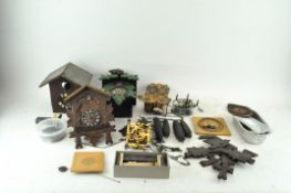 A collection of clock parts,