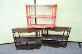 A pair of rosewood effect hanging wall shelves' 51cm x 70cm x 19cm;
