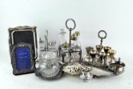 A collection of silver plated wares, including cruet frame,