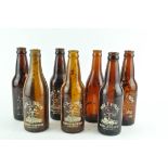 A collection of vintage brown glass beer bottles - Holt's of Burnham,