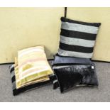 A parcel of Seven upholstered cushions in various sizes