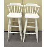 A pair of white painted bar chairs,