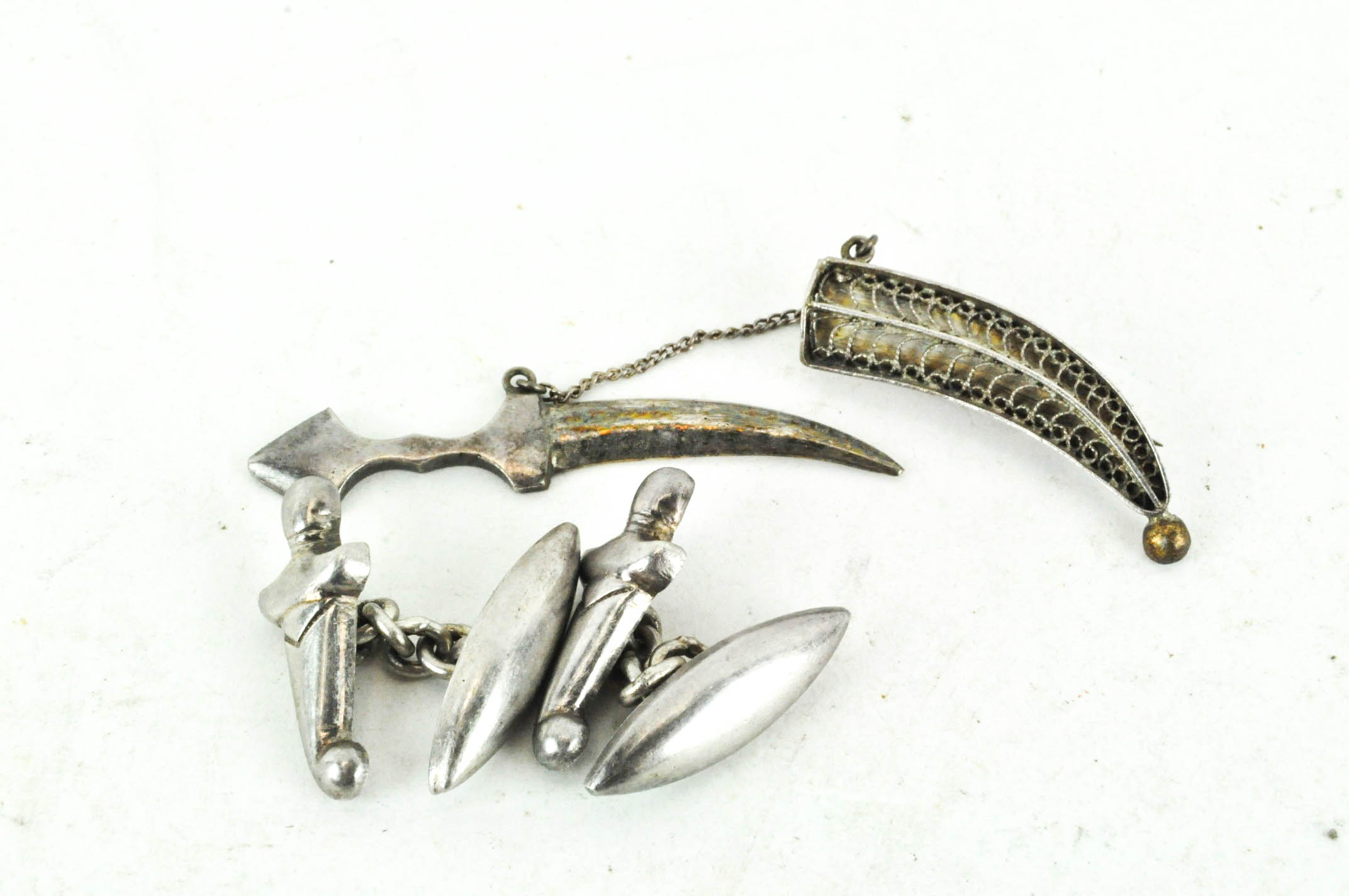 A pair of Middle Eastern white metal cufflinks,