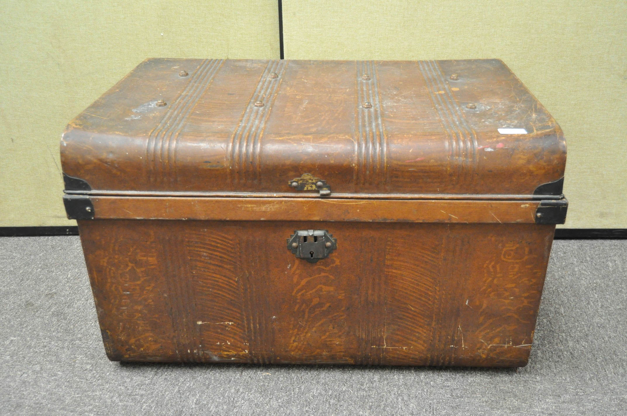 A large tin scumballed trunk,