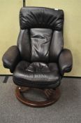 A leather recliner chair,