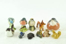 A group of ceramic figures of birds and animals including Royal Copenhagen,
