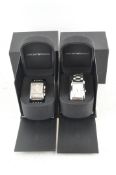 Two boxed Emporio Armani watches, with paperwork,