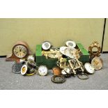 A box of clock movements and parts,