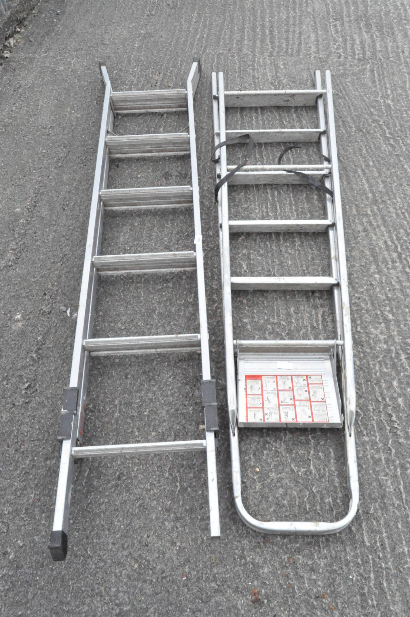 Two sets of aluminium ladders