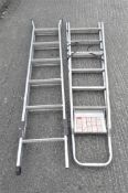 Two sets of aluminium ladders