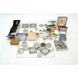 A collection of coins, mostly British,