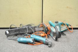 An electric chain saw and two Makita electric tools