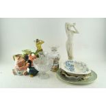 A collection of ceramics, including a Poole pottery pot, Wade Natwest pigs,