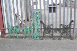 Two pairs of cast metal bench ends