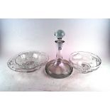 A ship's decanter and stopper, 20th century, together with various cut glass bowls,