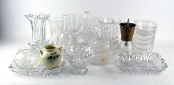 A collection of glassware including vases,