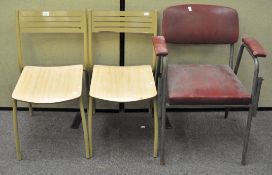 A pair of Ness stacking chairs, 76cm high,